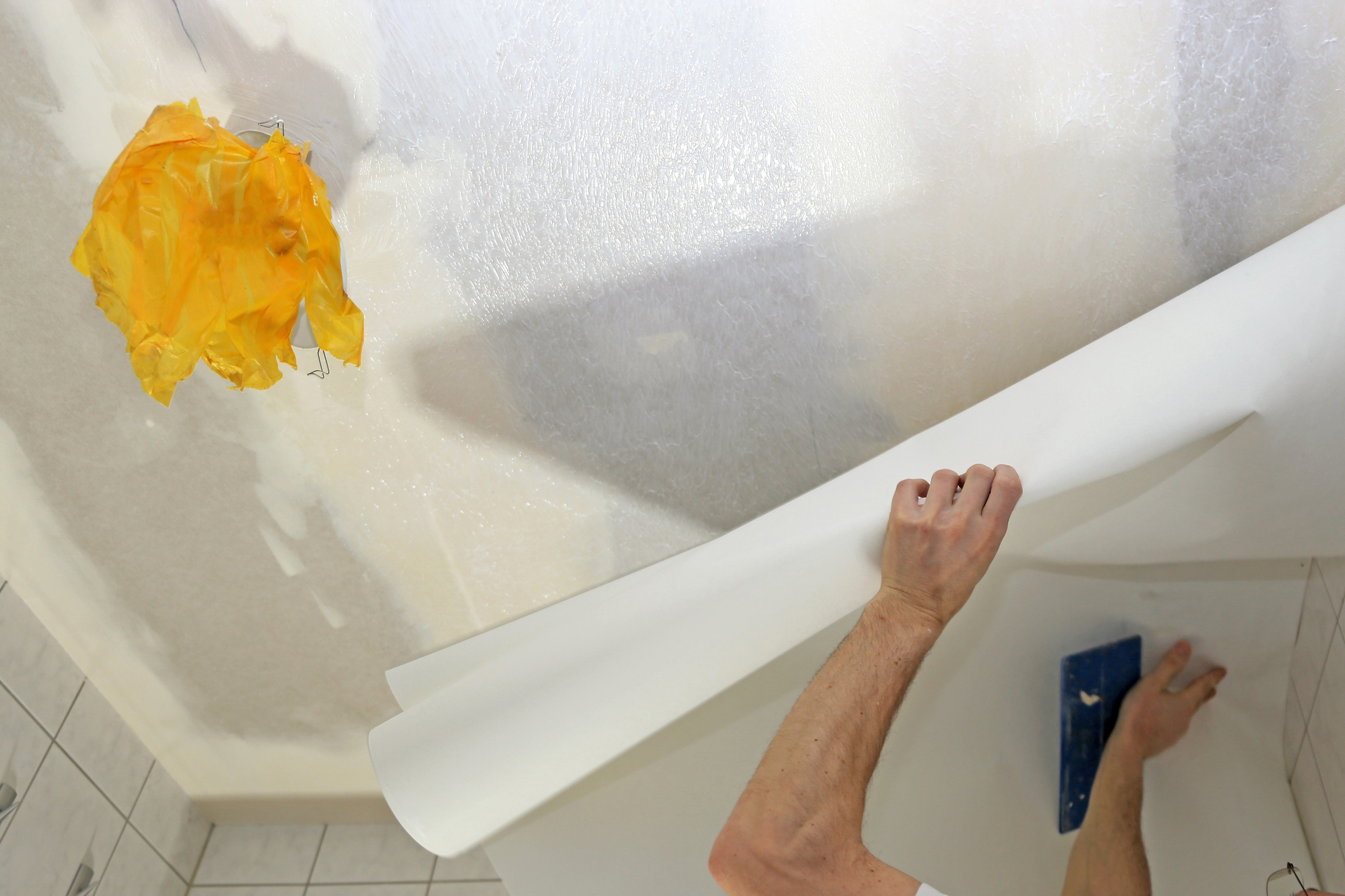 Wallpaper removal and wall preparation
